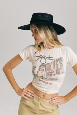 Model wearing the Mira Wide Boater hat, showcasing its style and fit.