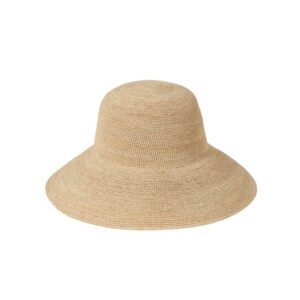 The Inca Sunhat, a hand-crocheted raffia straw bucket hat with a down brim, color may vary.
